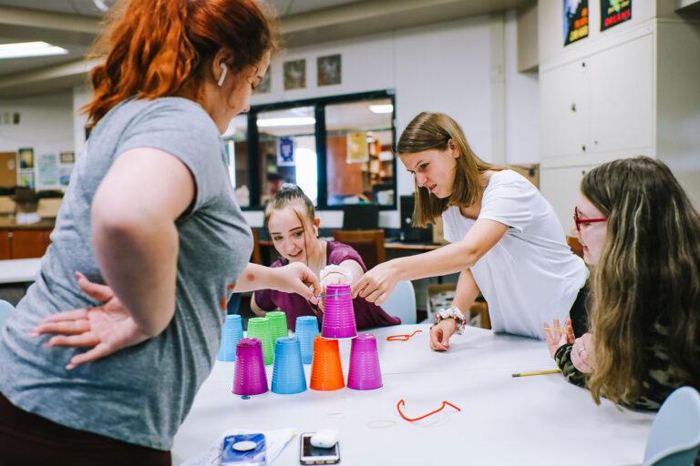 Students in high school working on a project