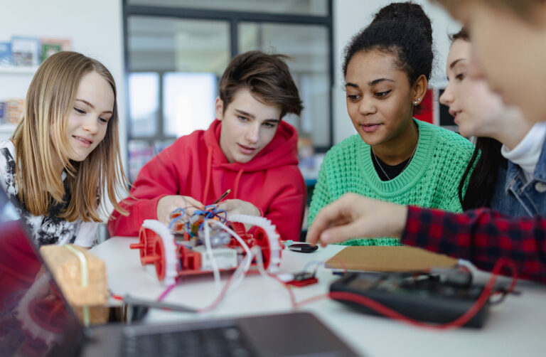 Students leaning robotics. Igniting Imagination and Creativity