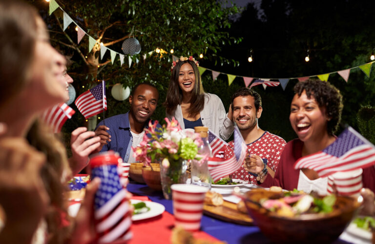 Friends Celebrating 4th Of July Holiday With Backyard Party